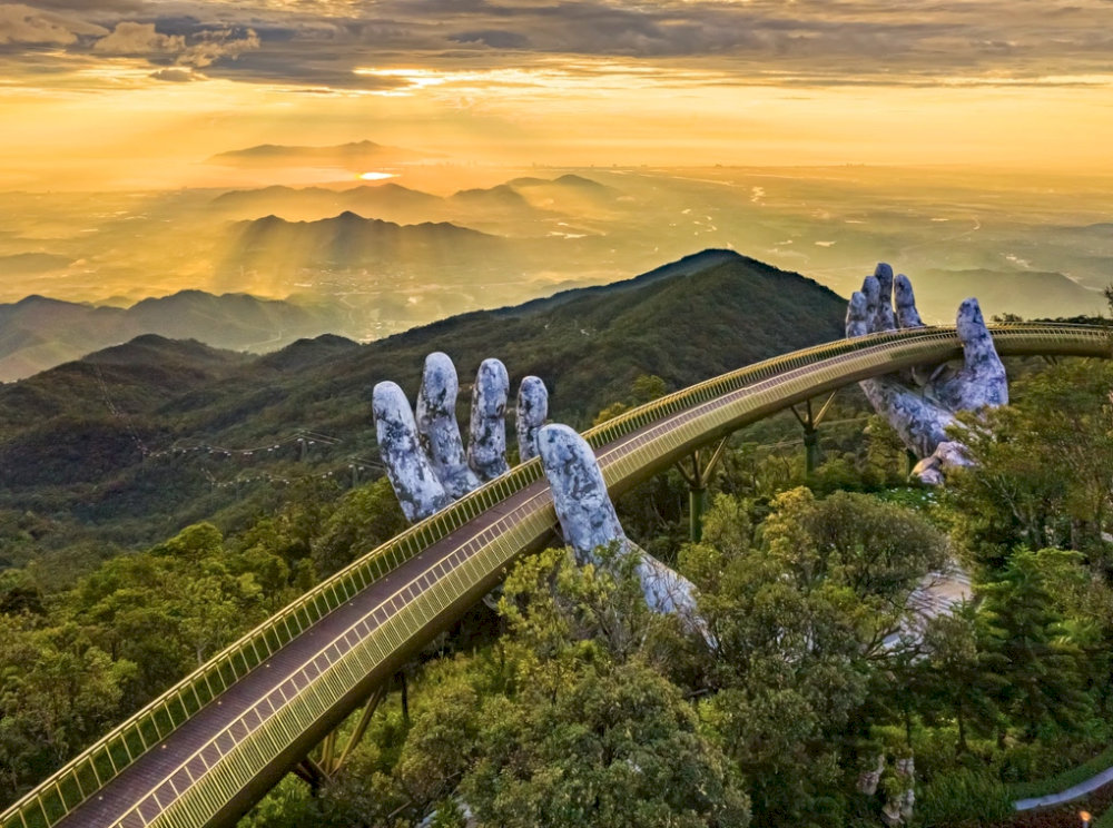 Danang's Golden Bridge - Giant hands cradling a pathway in the sky, a unique architectural icon attracting visitors from all over the world